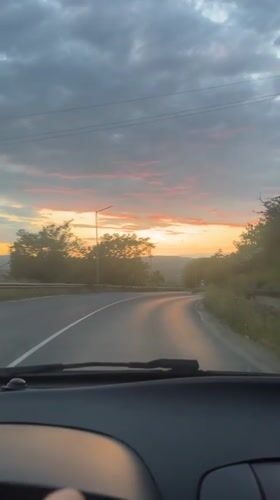 Evening drive documented through Blagoevgrad during vibrant sunset