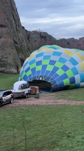 Hot air balloon prepared for dawn flight near Belogradchik