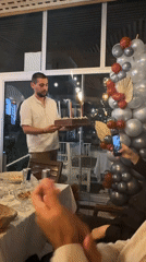 Birthday cake celebration captured in Sozopol, Bulgaria