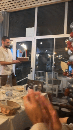 Birthday cake celebration captured in Sozopol, Bulgaria