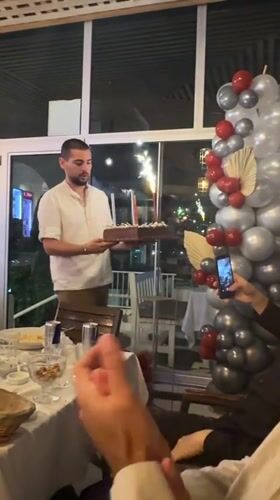 Birthday cake celebration captured in Sozopol, Bulgaria