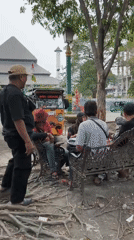 Morning at a Surakarta park: deer, food stalls, and shaded benches