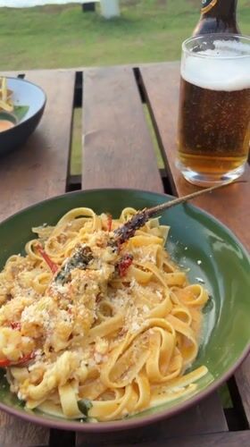 Waterfront dining captured in Weligama with lobster pasta meal