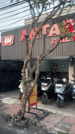 Street activity recorded at Denpasar motorcycle dealership
