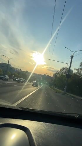 Evening traffic captured on video in Cheboksary during sunset