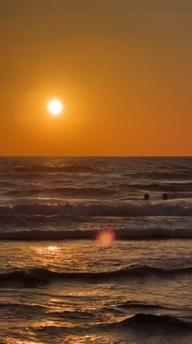 Sunset hour on the Bat Yam beachfront, Mediterranean Sea