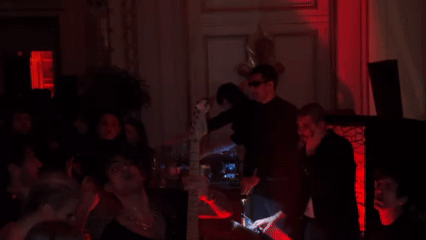 Band performs at dimly lit Paris club venue