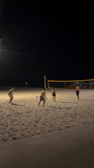Evening beach volleyball and selfies captured in Tel Aviv