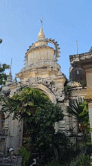 Hindu temple structures and Krishna statue documented in Denpasar