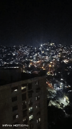 Night views and domestic moments captured across Caracas