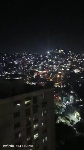 Night views and domestic moments captured across Caracas