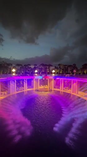 Evening light show at illuminated park complex in Krasnodar