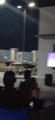 Nighttime football viewing gathering draws crowds in Guzape, Nigeria