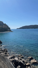 Clear waters and sunny skies captured at Budva coastline