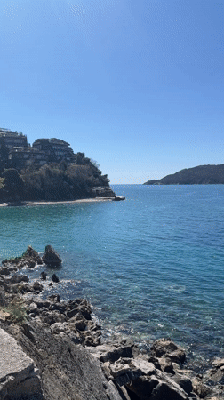 Clear waters and sunny skies captured at Budva coastline