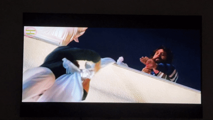 Viewer records action movie scenes featuring Las Vegas rooftop sequences