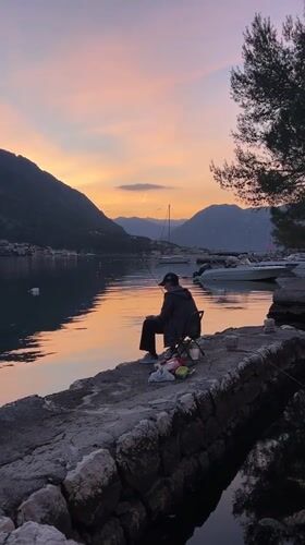 Evening waterfront life documented in Dobrota Montenegro coastal town