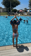 Family swimming day at Israeli community pool