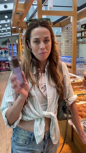 Woman makes mobile payments at bakery, airport cafe in Montenegro