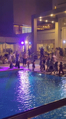 Evening pool gathering draws families at resort venue