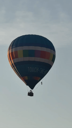Hot air balloons fill the sky over Dmitrov in summer