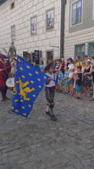 Renaissance festival parade winds through Český Krumlov's historic streets