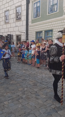 Renaissance festival parade through Český Krumlov's historic streets