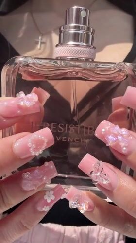 Person unboxes Givenchy perfume in Novosaratovka, Russia