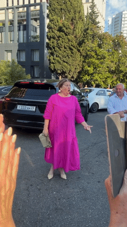 Red carpet event draws crowds to Sochi street on summer afternoon