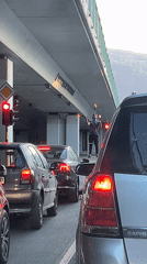 Torch-wielding figure on ladder stops traffic in Sofia