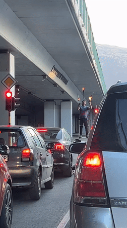 Torch-wielding figure on ladder stops traffic in Sofia