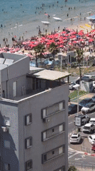 Elevated views capture busy beach day in Bat Yam