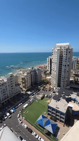 Elevated views capture busy beach day in Bat Yam