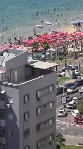 Elevated views capture busy beach day in Bat Yam