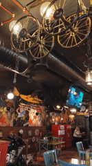 Industrial-themed restaurant in Yerevan features gaming decor, motorcycle display