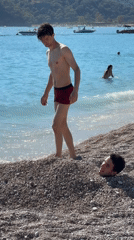 Families enjoy beach day activities in Fethiye, Turkey