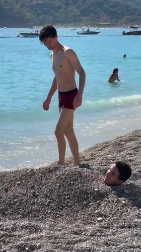 Families enjoy beach day activities in Fethiye, Turkey
