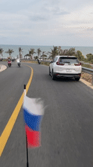 Casual tourist moments captured in Vietnamese coastal ward
