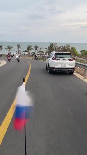 Casual tourist moments captured in Vietnamese coastal ward