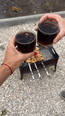 Backyard barbecue gathering features grilled chicken and casual toasts