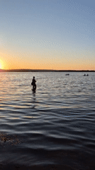 Sunset recreation captured along Voronezh Reservoir waterfront