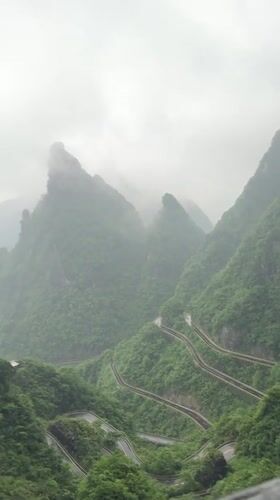 Rainy cable car ride documented at Tianmen Mountain, China