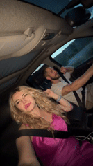 Woman films selfie video while passenger in Montenegro car