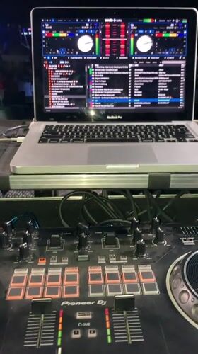Pioneer DJ controller and MacBook set up at Abuja outdoor event