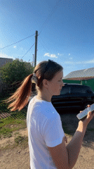 Two women enjoy casual afternoon outing in rural Foki, Russia