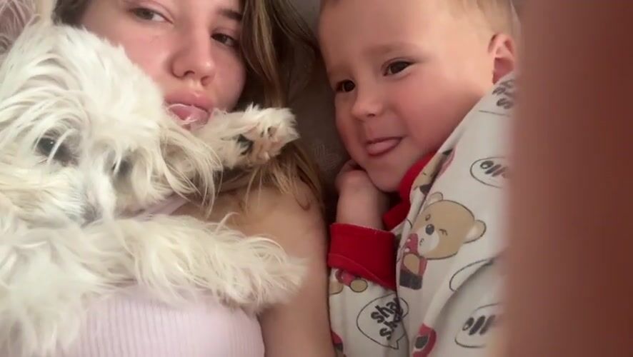 Lazy afternoon at home with a fluffy white dog