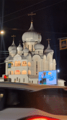 Illuminated Orthodox church observed at night in Saint Petersburg