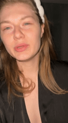 Woman speaks to camera in nighttime Kazan recording