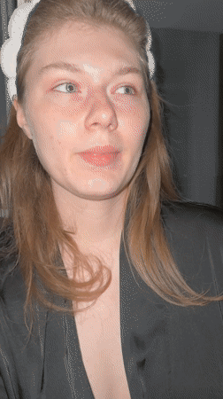 Woman speaks to camera in nighttime Kazan recording