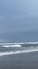 Typical morning beach scene captured in North Kuta, Indonesia